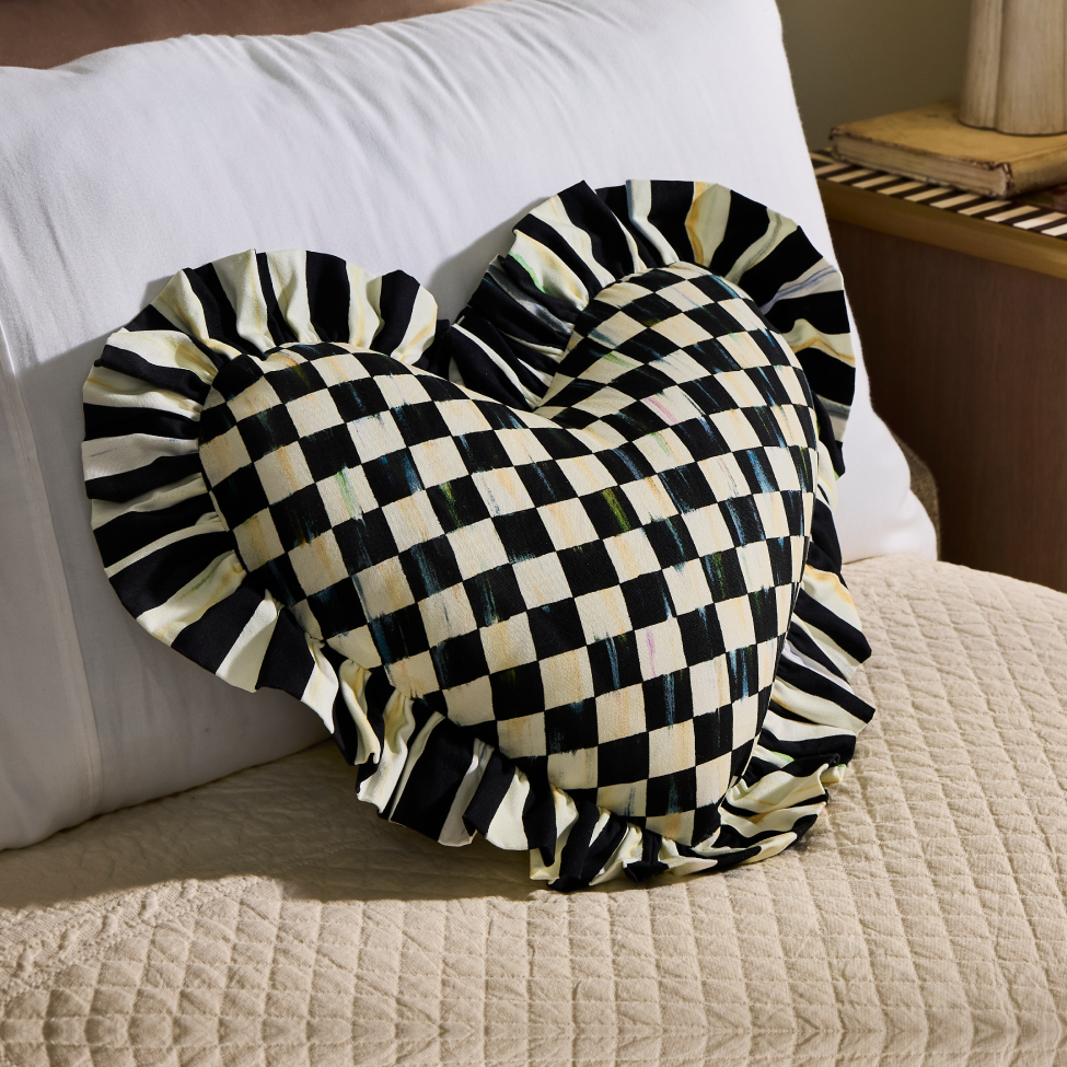 Layer Your Space With Cozy - image features heart shaped pillow
