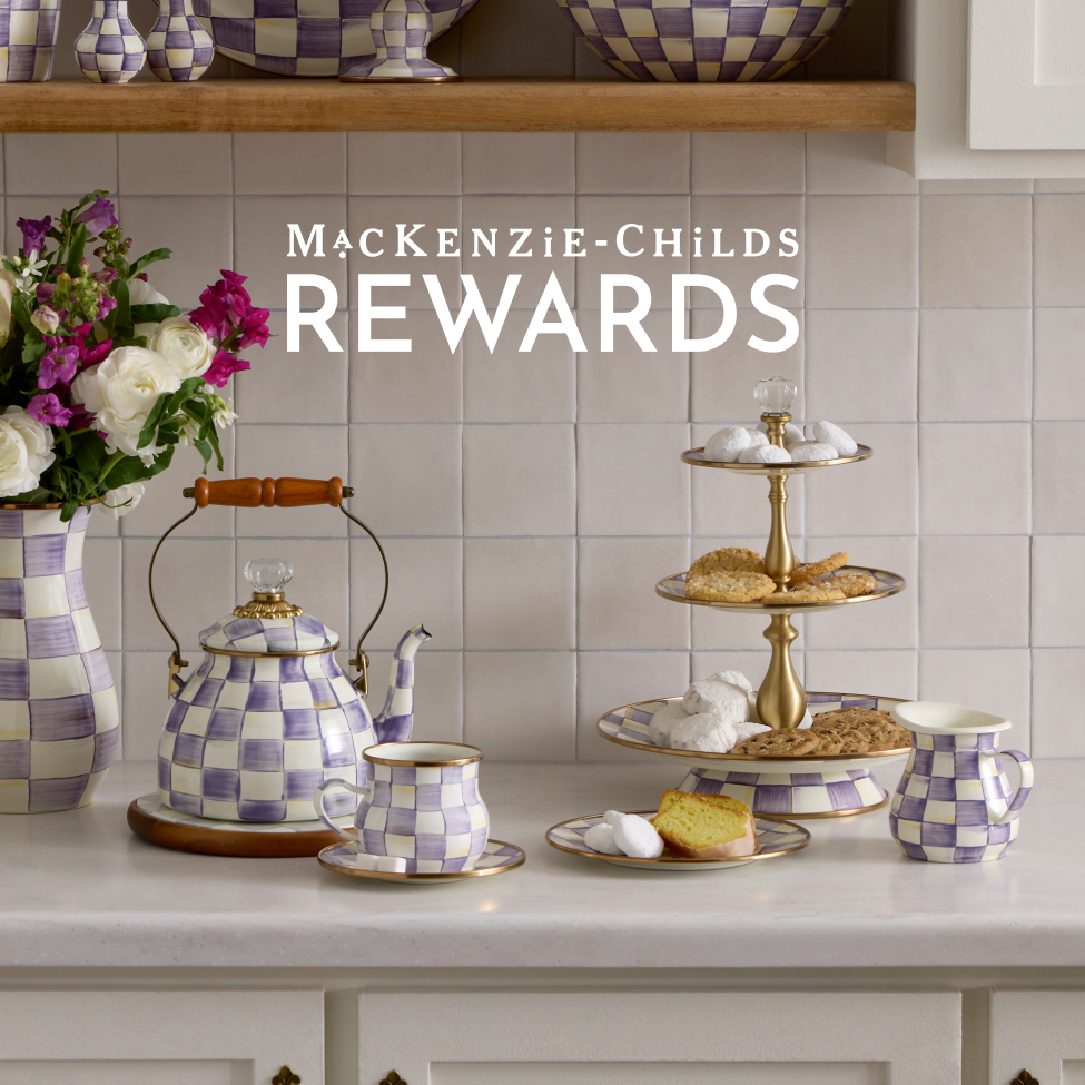 Sign up for Mackenzie-Childs Rewards Earn 2X Points On Violet Check - Image features violet check tea kettle and serveware
