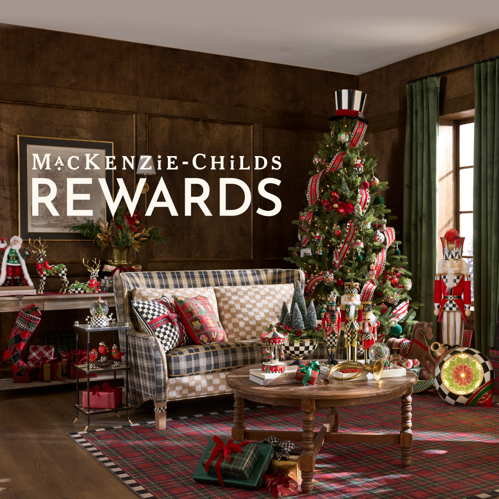 Sign up for Mackenzie-Childs Rewards earn 2X points every time you shop for a limited time - Image features festive holiday living room