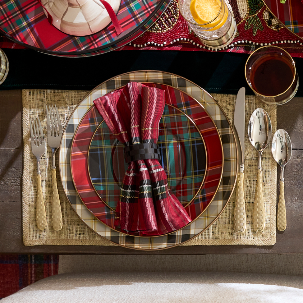 Holiday Hosting Delivered In Time - image features tartan place setting
