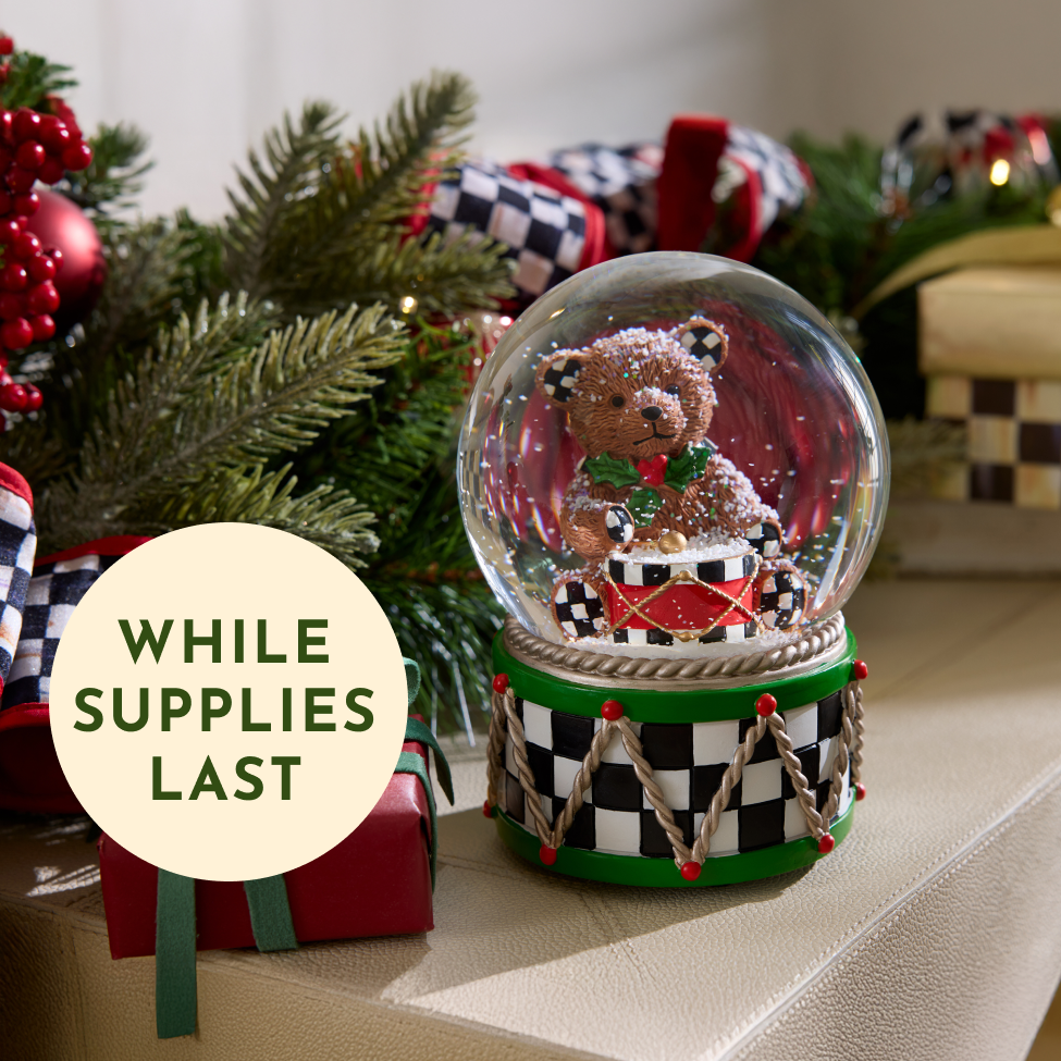 Free Gift When You Spend $150+ while supplies last - image features Bear Snow Globe
